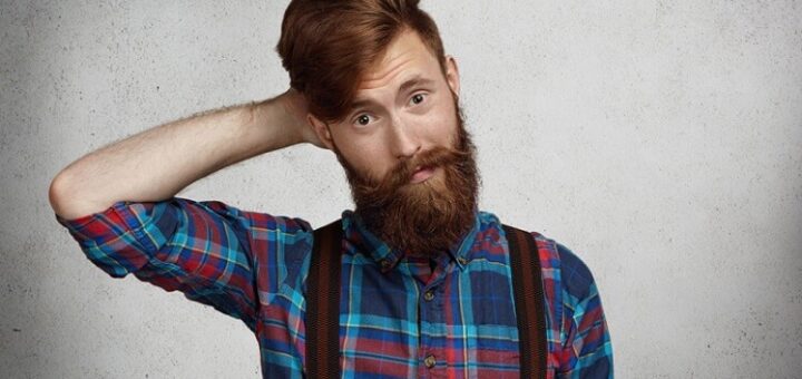 a hipster young man with long beard