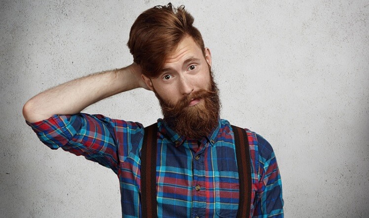 a hipster young man with long beard