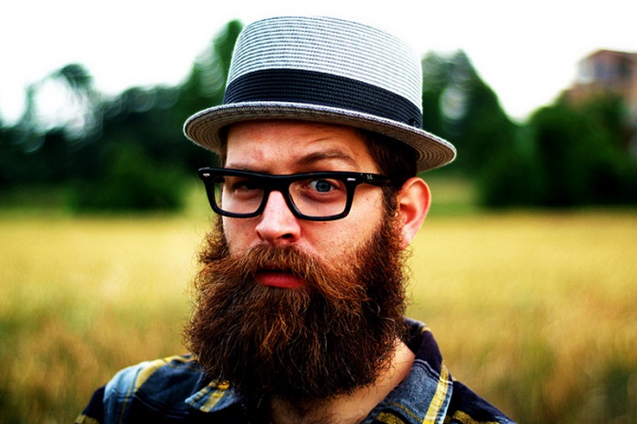 a hipster man with long beard