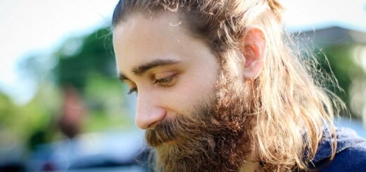 a young man with a thick beard