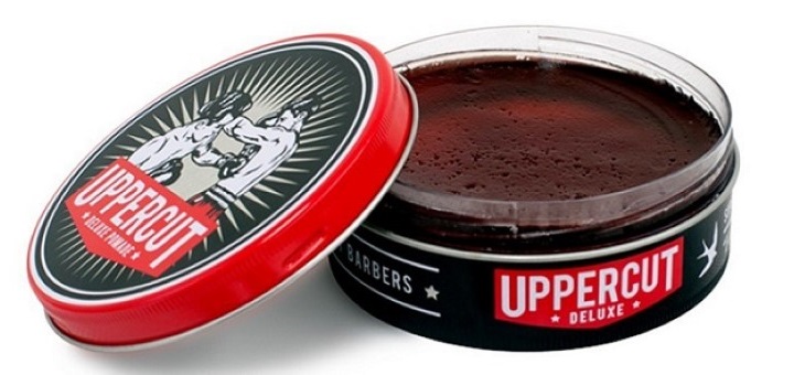 an open jar of Uppercut Deluxe pomade for men