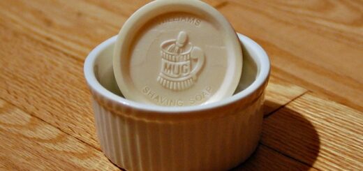 a round unscented shaving soap in a small bowl