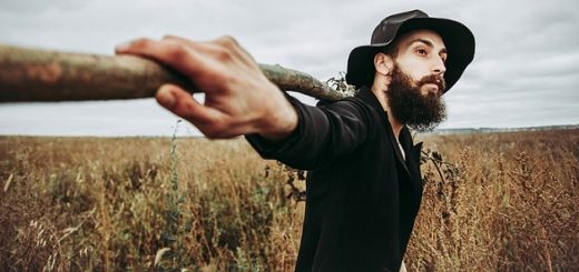 a young man with a long beard