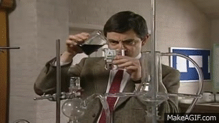 mr.bean is testing and combining chemicals inside the laboratory