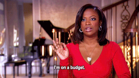 woman is saying that she is on a budget