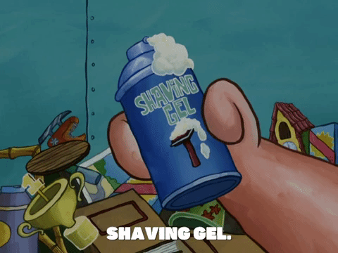 holding a shaving gel for his shaving needs